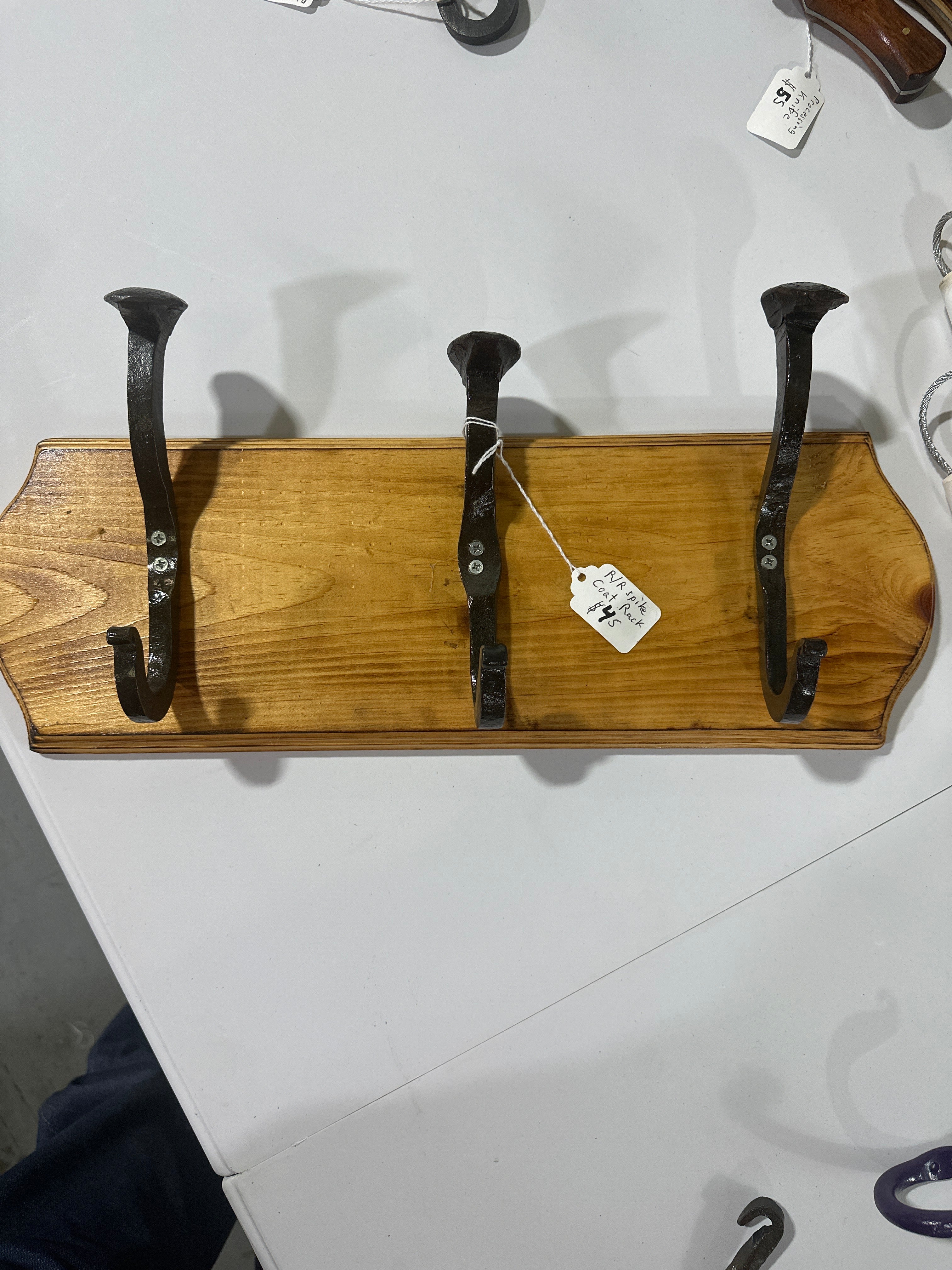 Railroad spike coat rack